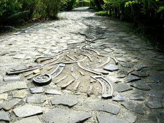 Tiles are often recycled in paths and walls. The paths around the museum have tiles laid into them.