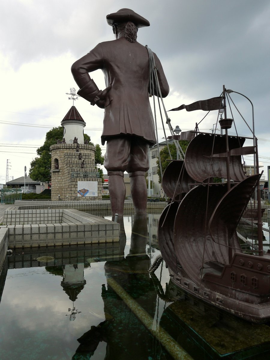 Large statue of Gulliver towing Lilliputian ships outside Omi-Takashima Station.