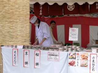 Vendor selling dango-mochi and sakura-mochi (traditional sweet rice cakes)