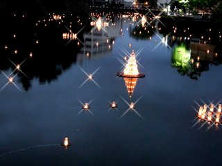 Lanterns floating in the castle moat
