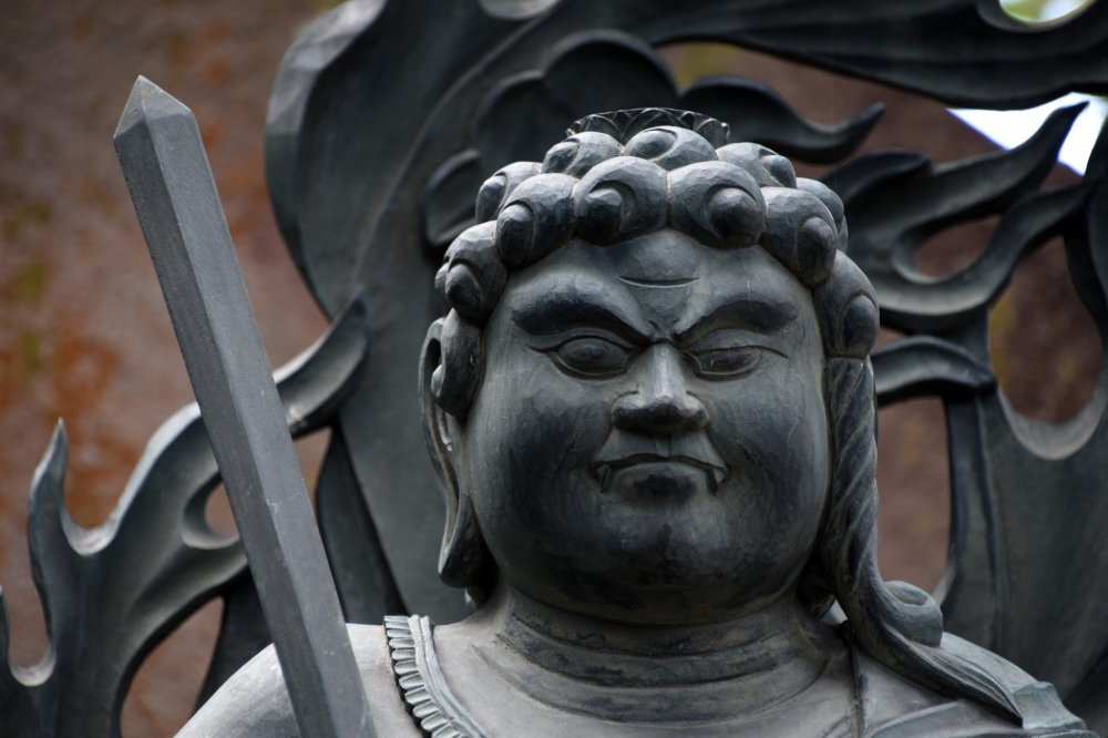 Statue of Fudo Myo-o with a strong, serious face