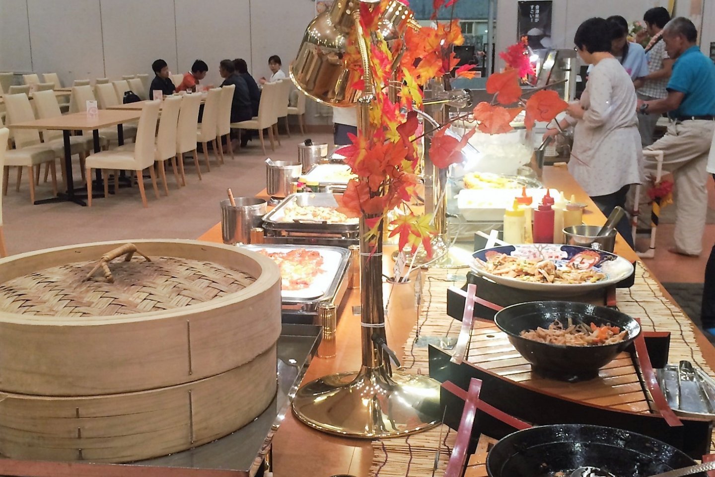 The fall display of food at one of the three tables of food.