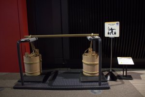 Test your strength with these waste buckets at the Edo-Tokyo Museum