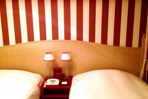 Playful Candy Striped Guest Rooms is funky and delightful in an quaint English manner at Hotel Monterey Kyoto