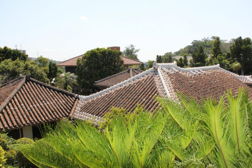The rooftops of the Nakamura House are decoratively protected by Okinawan red tile.