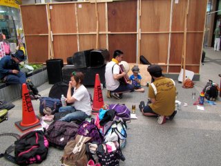 A group of performers preparing for their act