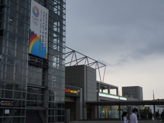 The banner on the left mentions the 2020 Olympics and Paralympics, for which Tokyo is a candidate city. If Tokyo is selected, Tokyo Big Sight will host certain events like wrestling, powerlifting, boccia, Taekwondo, and fencing.