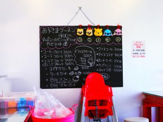 The chalk board advertises the special coffee and sweets menu
