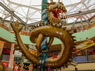 True to its name, a large Dragon is located in the center of the building