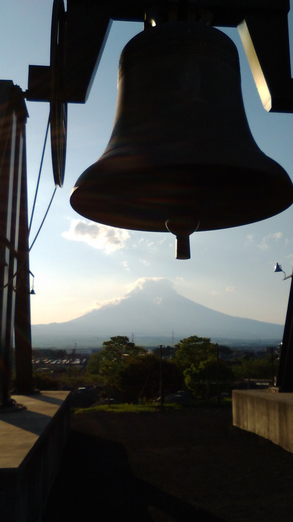 Tokinosumika is home to the third heaviest bell in Japan. You can see Mt Fuji under the bell.