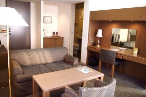 The living room of the spacious hotel suite in Kita hotel.
