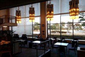The lounge opposite the lobby features views, pay massage chairs, and a 3000 comic/manga library.
