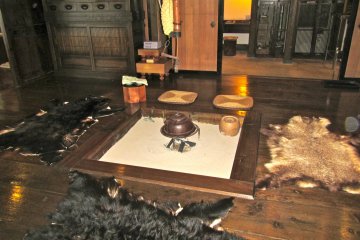 <p>Have you ever sat on a bear skin rug while dining?</p>