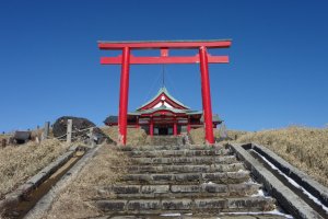 At the very first, your eye will be captured by red shrine pillars and a red gate against the blue sky