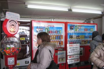<p>Vending machines offering soft drinks and beer.</p>