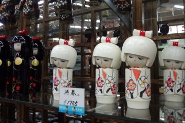 Kokeshi is a Japanese cylindrical wooden doll. It’s pretty and makes a thoughtful souvenir.