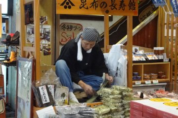 In front of one shop you might find a man demonstrating how they make slices of dried, shaved seaweed.