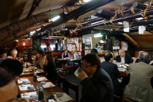Andy&#39;s is located under the Shinkansen tracks and you&#39;ll hear it run overhead periodically if the crowd noise is not too great. Its arched roof and warm interior make it a very memorable place. There is an atmosphere here that is hard to match, even in Japan