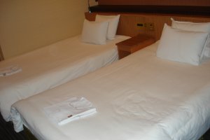 Hotel beds are great because you don't have to make them in the morning!