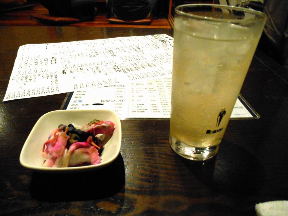 Sudachi Chu-hai (Shochu mixed with soda). Sudachi is one of Tokushima&#39;s specialties; green-colored small citrus. They are very expensive when bought outside Tokushima, but here, they are common and you eat it every day. What a luxury!