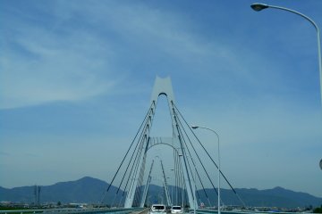 <p>Crossing the Shikoku Saburo Bridge over the Yoshino River, on the way from Tokushima to Bando, where you can visit the&nbsp;Naruto German House and Bando POW Camp Site. This bridge, fairly new, was constructed in 1998.</p>