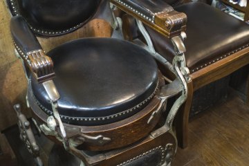 <p>An antique Japanese barber chair made in 1916.</p>