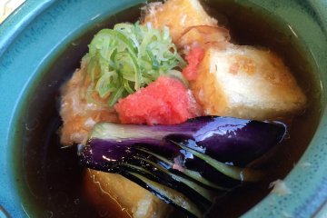 <p>Must try the Fried Tofu which is served in broth, topped with shallots and eggplant.</p>
