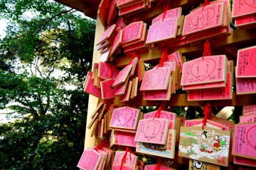 <p>Ema - wooden plaques with requests to Shinto gods written on them</p>