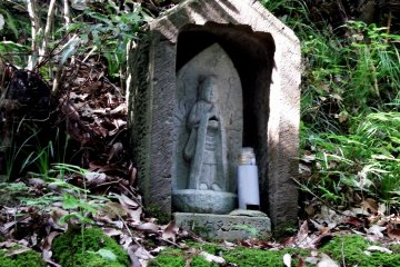 <p>Very small Kannon statue (goddess of mercy) I found on the way to the cemetery of the Matsudaira Clan</p>