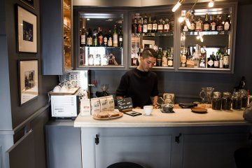 <p>Paddlers Coffee is hiding in the corner of an expensive clothing store for men. The bar only fits three.</p>