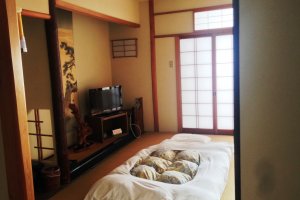Spacious guest rooms decorated in traditional Japanese style at Kagetsu&nbsp;Ryokan hotel about 30 minutes from Maizuru Cruise Ship Terminal