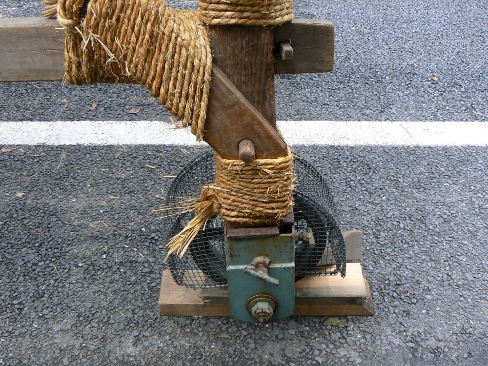 The struts are held together by wooden pegs and rope