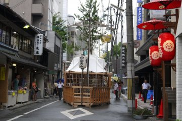 <p>Some of the floats are decorated with live pine or bamboo branches</p>