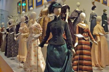 Museum display of 19th Century European dresses