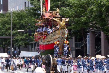 <p>Fune-hoko (船鉾) During the Yamaboko Junko (山鉾巡行) in Kyoto, 2012!&nbsp; This float is based on a famous story about the legendary Empress Jingu of ancient Japan. After the death of her husband, and while pregnant with child, Empress Jingu armed herself and headed for war aboard a ship. This float as a whole is shaped like a boat and is enclosed with a vermilion parapet. On the front of the float is a mythical golden bird known as Geki</p>