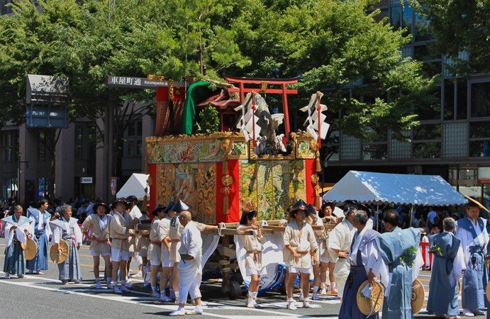 Koi-Yama (鯉山) During the Yamaboko Junko (山鉾巡行) in Kyoto, 2011! This float features a large jumping carp (&ldquo;Koi&rdquo; in Japanese) that is courageously swimming up the &ldquo;Ryumon&rdquo; falls, which literally means &ldquo;dragon gate&rdquo;. According to an ancient Chinese legend, a carp can change into a dragon if the fish successfully swims up this waterfall on the Yellow River (in China, the dragon is a symbol of greatness)