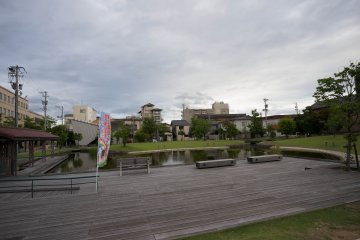 <p>A pond in the middle of the city</p>