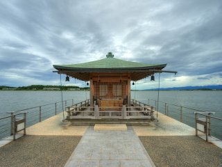 A floating small temple out in the lake