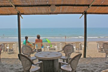 <p>Cool off by taking a break inside the natural setting of the Blue Moon beach house dining area.</p>