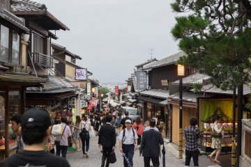 <p>The street filled with people and shops</p>