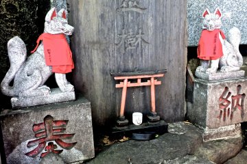 <p>In the back corner of the temple</p>