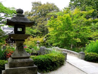 A stone lantern beside the pond