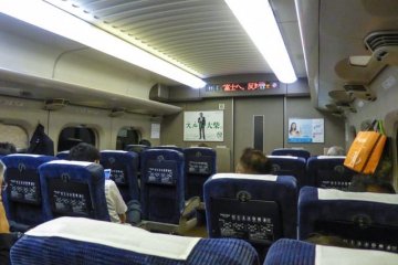 <p>The clean airplane like feel on the inside of the Shinkansen</p>