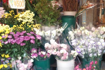 <p>One stall sells fresh flowers</p>