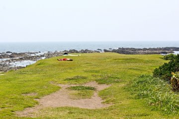 สนามหญ้า isthmus ซึ่งอยู่ระหว่างกลางของชาดหาดโค้ง หาดอิชิกิ