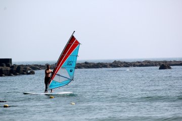 Windsurfing is a popular water sport on the north end of Isshiki