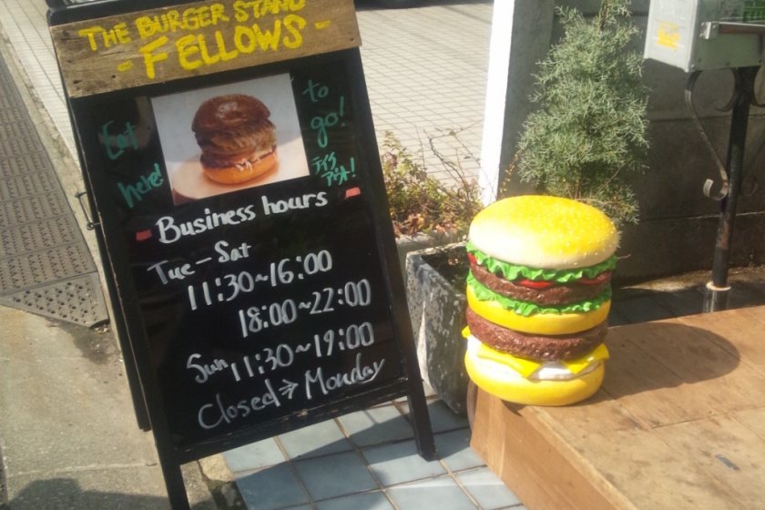 Fellows\' signboard and plastic burger (almost real size)