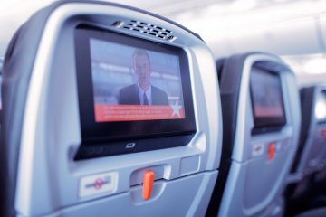 <p>The flight&#39;s instructional safety video is brought to all passengers by the seat back entertainment system</p>