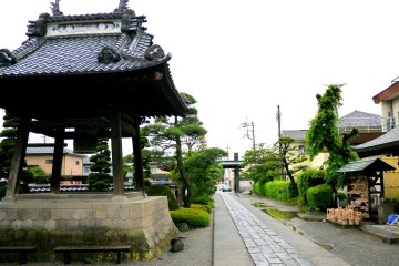 <p>Looking past the bell tower toward the gate</p>