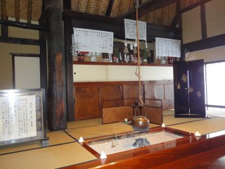 Shinto ornaments and a fireplace in the hotel